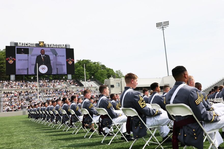 WEST POINT, NEW YORK - MAY 22: West Point graduates watch as U.S. Secretary of Defense Lloyd J. Austin III speaks during the 2021 West Point Commencement Ceremony on May 22, 2021 in West Point, New York. U.S. Secretary of Defense Lloyd Austin returned to his alma mater to deliver the U.S. Military Academy’s Class of 2021 commencement address. There are 995 cadets in this years graduation class.  (Photo by Michael M. Santiago/Getty Images)
