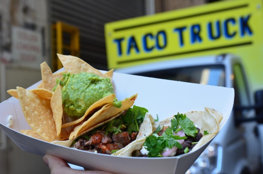 Beef, black bean taco, corn chips and guacamole AUD15 - Taco Truck at Melbourne Central. 
Yummy tacos, and crisp freshly made corn tortilla chips topped with chunky guacamole. Fonda was better though.
