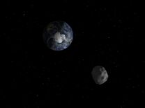 An image showing how 2012 DA14 asteroid will safely fly by Earth on Feb. 15, 2013.