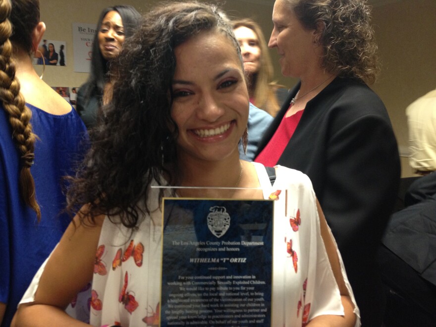 Withelma Ortiz-Macey, 22, is honored by the L.A. County probation department for lending her voice and story of sexual exploitation to create awareness about sex trafficking.