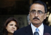 In 2010, Councilman Richard Alarcon, right, and his wife, Flora Montes De Oca Alarcon speak to media outside court where they were indicted on a total of 24 felony counts stemming from allegations Richard Alarcon lived outside his district. The charges were eventually dismissed by a judge, but prosecutors refiled them in the form of a criminal complaint.