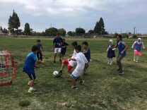 Kids play soccer as part of a free "summer camp" for refugee children in Westminster set up by World Relief, a refugee resettlement agency in Garden Grove. 