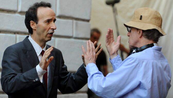 US film director Woody Allen speaks to Italian actor-director Roberto Benigni on the set of 'Bop Decameron' at St.Maria in Trastevere square in central Rome, on August 8, 2011. AFP PHOTO/ TIZIANA FABI (Photo credit should read TIZIANA FABI/AFP/Getty Images)