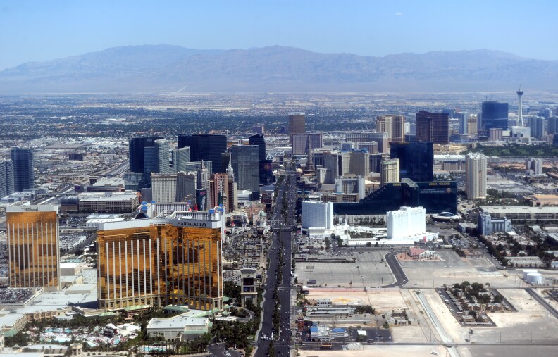 Aerial view of the Las Vegas boulevard, the Strip, in Las Vegas, Nevada on June 10, 2011. The Las Vegas Strip is an approximately 4.2-mile (6.8 km) stretch of Las Vegas Boulevard in Clark County, Nevada, adjacent to, but outside the city limits of Las Vegas proper. Many of the largest hotel, casino and resort properties in the world are located on the Las Vegas Strip. Nineteen of the world's 25 largest hotels by room count are on the Strip, with a total of over 67,000 rooms. AFP PHOTO / GABRIEL BOUYS (Photo credit should read GABRIEL BOUYS/AFP/Getty Images)