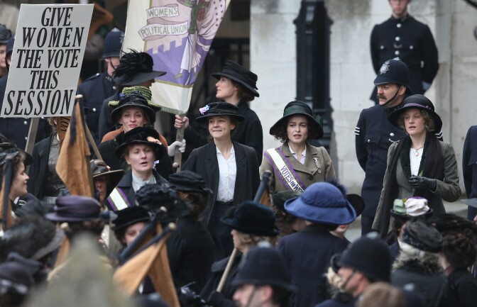 Actors (L-R) Anne-Marie Duff, Carey Mulligan, Helena Bonham Carter and Romola Garai take part in filming of the movie Suffragette at Parliament on April 11, 2014 in London, England.