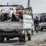 Syrians flee  with their belongings the countryside of the northeastern Syrian town of Ras al-Ain on the Turkish border, toward the west to the town of Tal Tamr on October 19, 2019. - Turkey's President Recep Tayyip Erdogan fired off a fresh warning today to "crush" Kurdish forces as both sides traded accusations of violating a US-brokered truce deal in northeastern Syria. (Photo by Delil SOULEIMAN / AFP) (Photo by DELIL SOULEIMAN/AFP via Getty Images)