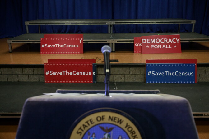 NEW YORK, NY - APRIL 3: Signs sit behind the podium before the start of a press conference with New York Attorney General Eric Schneiderman to announce a multi-state lawsuit to block the Trump administration from adding a question about citizenship to the 2020 Census form, at the headquarters of District Council 37, New York City's largest public employee union, April 3, 2018 in New York City. Critics of President Donald Trump's administration's decision to reinstate the citizenship question contend that that it will frighten people in immigrant communities from responding to the census. The Trump administration has stated a citizenship question on the census will help enforce voting rights. (Photo by Drew Angerer/Getty Images)