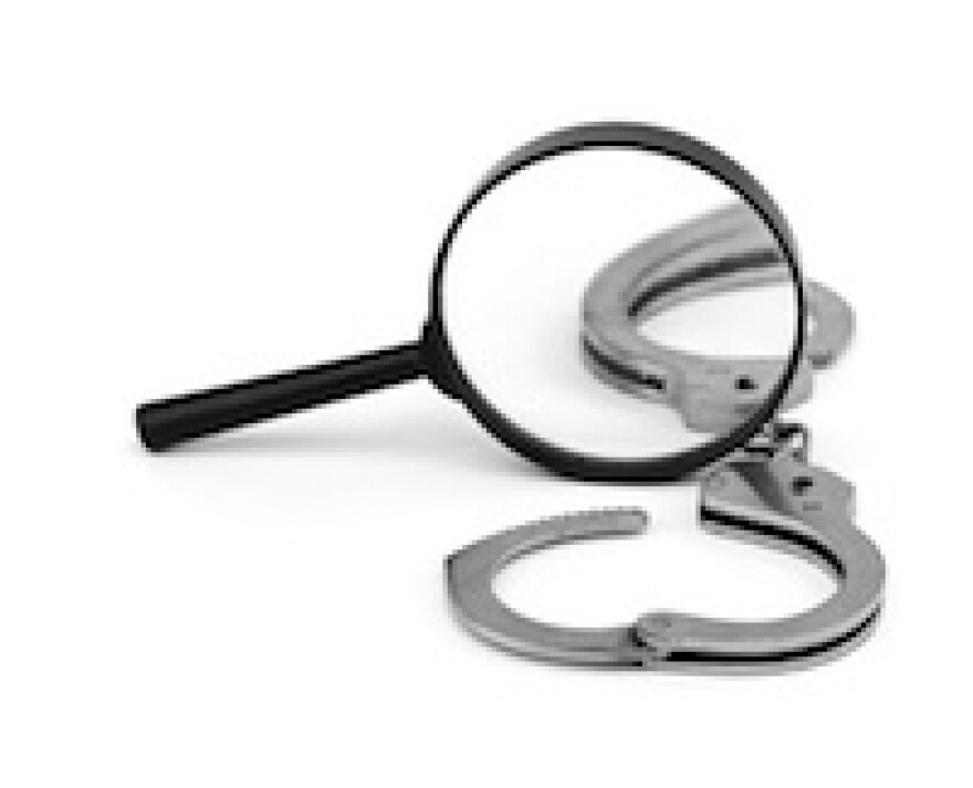 handcuffs-magnifying-glass-shutterstock.jpg