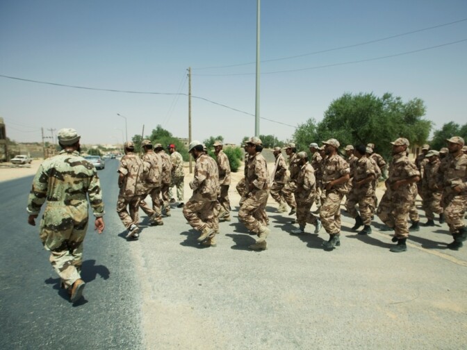 Specially selected rebel fighters march through the streets of Zintan, Libya. These rebels will be trained in urban combat in anticipation of an expected move toward Tripoli.