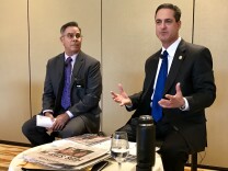 Orange County Supervisor Todd Spitzer (right) answers questions from Hispanic 100 board member John Cruz at a candidates' forum on April 26, 2018. Spitzer is challenging Orange County District Attorney Tony Rackauckas, who was absent, in the 2018 election. 
