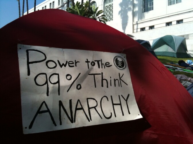 A sign on one of the tents set up outside Los Angeles City Hall as part of Occupy LA