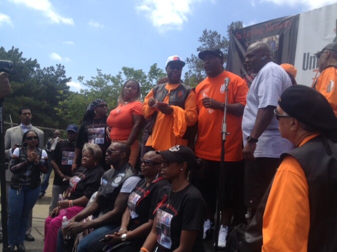 Organizers of the "peace ride" and leaders of the various car and motorcycle club rally together at the start of the event. 