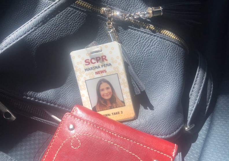 Marina Peña's work badge reads: SCPR, Marina Pena, News. Intern Take 2 with her photo in the center.