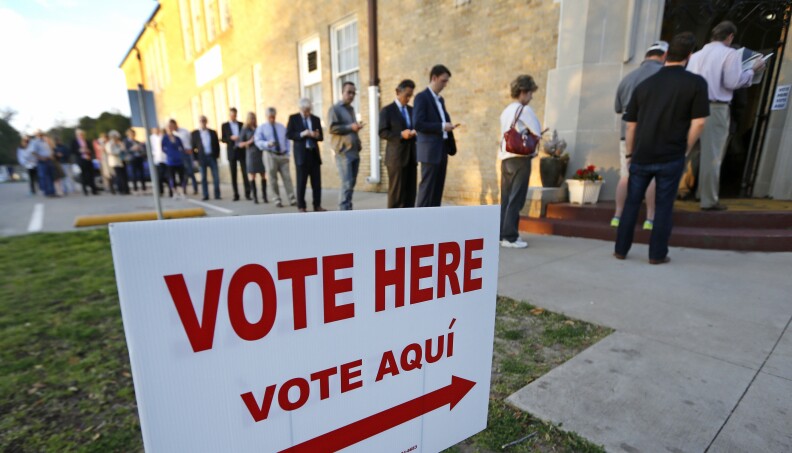 Voters in Fort Worth, Texas, line up to cast their ballots on Super Tuesday, March 1, 2016. Voters in 13 states and American Samoa are holding presidential primary elections, with over 1,400 delegates at stake.