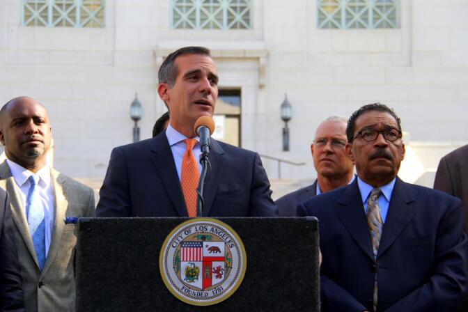 L.A. Mayor Eric Garcetti, alongside members of Los Angeles City Council, announces an initiative to provide $100 million to address the city's homeless population.