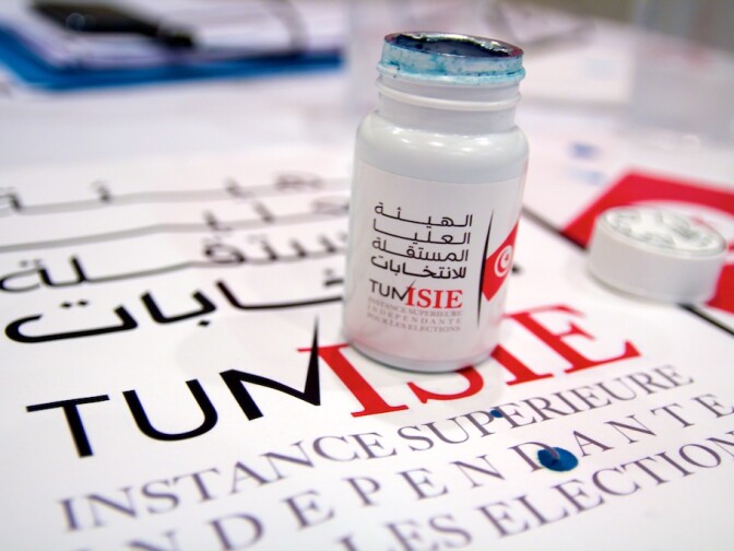 Voters dip their finger into this bottle of blue ink to signify that they have voted.