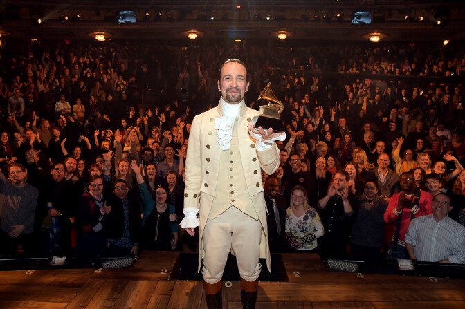 Composer, actor Lin-Manuel Miranda celebrates Grammy award on stage during "Hamilton" Grammy performance for the 58th Grammy Awards at the Richard Rodgers Theater on Feb. 15, 2016 in New York City.