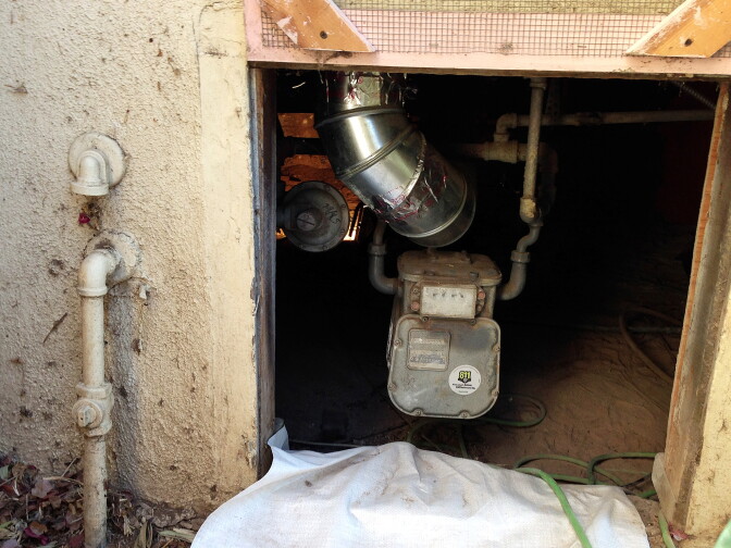 Contractors often get very little room in which to enter the crawlspace beneath a home. Retrofitting is not a job for the claustrophobic.