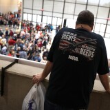 DALLAS, TX - MAY 04:  An attendee looks at a line to enter the NRA-ILA Leadership Forum during the NRA Annual Meeting & Exhibits at the Kay Bailey Hutchison Convention Center on May 4, 2018 in Dallas, Texas.  The National Rifle Association's annual meeting and exhibit runs through Sunday. (Photo by Justin Sullivan/Getty Images)