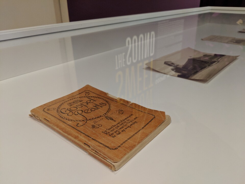 A copy of the hymnal "Gospel Pearls," ca. 1920s, on display at "How Sweet the Sound" at the California African American Museum. "From it, the term 'gospel music' was coined and adopted by black churches because of its dissemination," says curator Tyree Boyd-Pates.