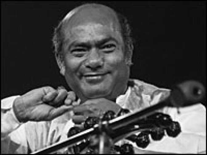Indian sarod player Ali Akbar Khan (1922 - 2009) performing at The Concert for Bangladesh, Madison Square Garden, New York City,   August, 1, 1971.