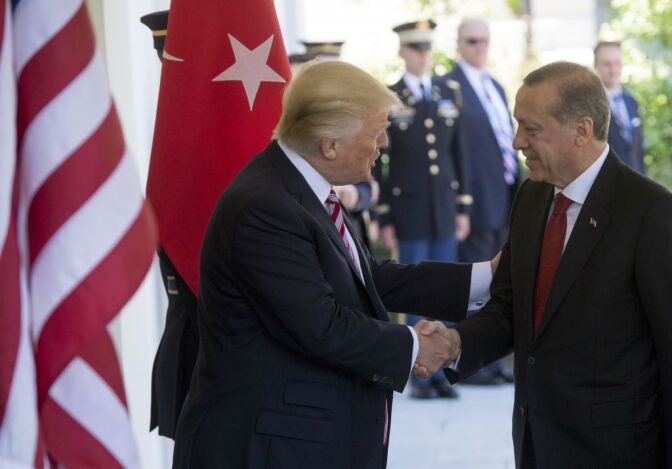 US President Donald Trump shakes hands with Turkish President Recep Tayyip Erdogan as he arrives for meetings at the White House in Washington, DC, May 16, 2017. / AFP PHOTO / SAUL LOEB        (Photo credit should read SAUL LOEB/AFP/Getty Images)