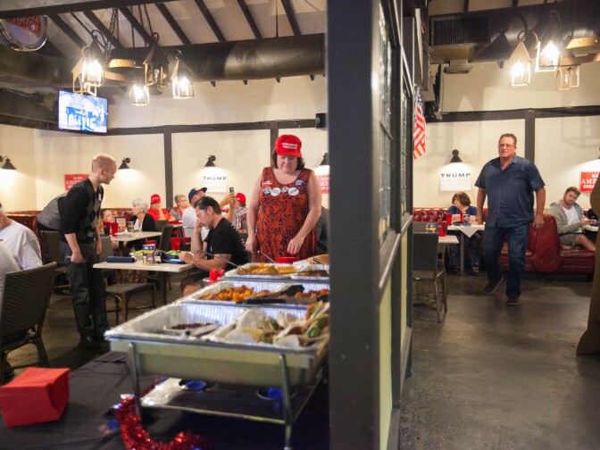 Trump supporters gather moments before the second presidential debate at JJ's Bar & Grill in Santa Clarita, Calif. on Sunday, Oct. 9, 2016.