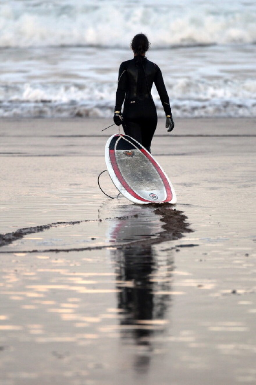 Bob Meistrell, who co-founded the Body Glove clothing company and helped develop the first neoprene wetsuit, died Sunday iin Southern California. He was 84. (Photo: Surfers head out at Coldingham Bay an inlet in the North Sea on February 15, 2012 in Coldingham, Scotland. Improved wetsuit materials and technology allowed the sport for become an all year-round activity)