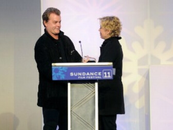 Director Cindy Meehl accepts the Audience Award for 'Buck' from Ray Liotta at the 2011 Sundance Film Festival Awards Night Ceremony.