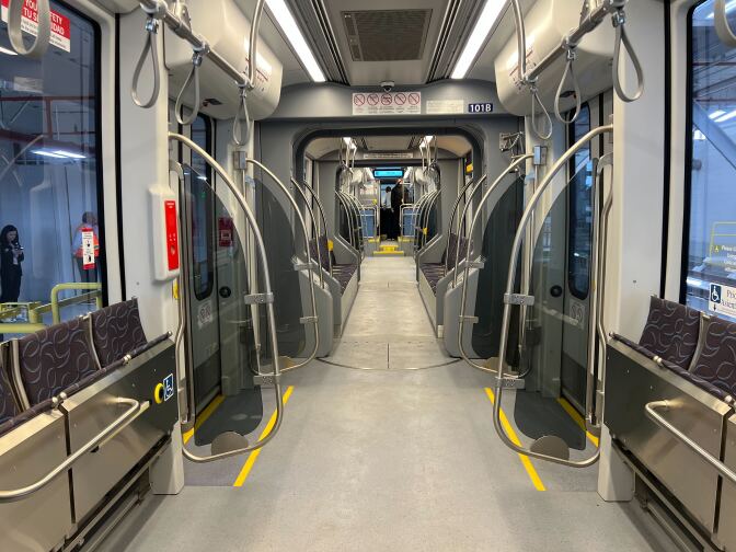 The inside of a light rail street car.