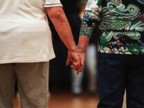 A new book shares how couples can team up to help their health with weight loss and exercising more. 