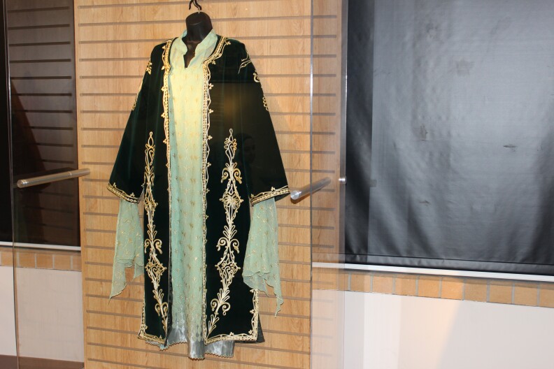A green two-piece dress from the Deir Ezzor district.