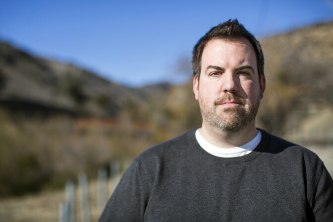 Sean O'Rourke is a Porter Ranch parent and a former member of the Porter Ranch Neighborhood Council. O'Rourke stands outside SoCal Gas' Aliso Canyon Storage Facility on Monday afternoon, Dec. 14, 2015.