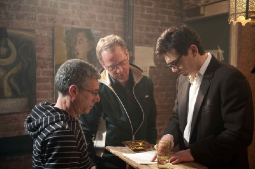 Directors Jeffrey Friedman and Rob Epstein work with James Franco on the set of HOWL. 