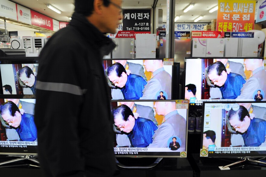 Television moitors displayed at the Yongsan electronic market shows the news of Jang Song-thaek's excution in Seoul on December 13, 2013. North Korea has executed the uncle of its leader Kim Jong-un after a shock purge, state news agency KCNA announced early on December 13, branding the once-powerful Jang Song-Thaek a 'traitor'.