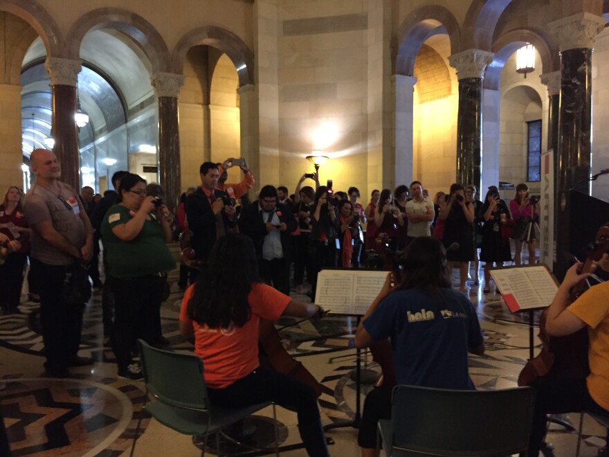 A group of young cellists from Youth Orchestra LA at the Heart of Los Angeles (YOLA at HOLA) played for advocates as they gathered in the rotunda ahead of the meeting.