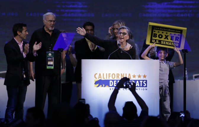 U.S. Senator Barbara Boxer, D-Calif, center, waves after speaking before the California Democrats State Convention Saturday, Feb. 27, 2016, in San Jose, Calif. (AP Photo/Ben Margot)