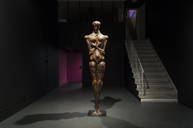 Maxine Kim Stussy: The Watcher, 1980, wood assemblage, height: 89 in.; metal base: 18 x 18 in. At "The Human Beast: Art of Maxine Kim Stussy & Jan Stussy," at WUHO (6518 Hollywood Blvd., Los Angeles, CA 90028) through February 9.