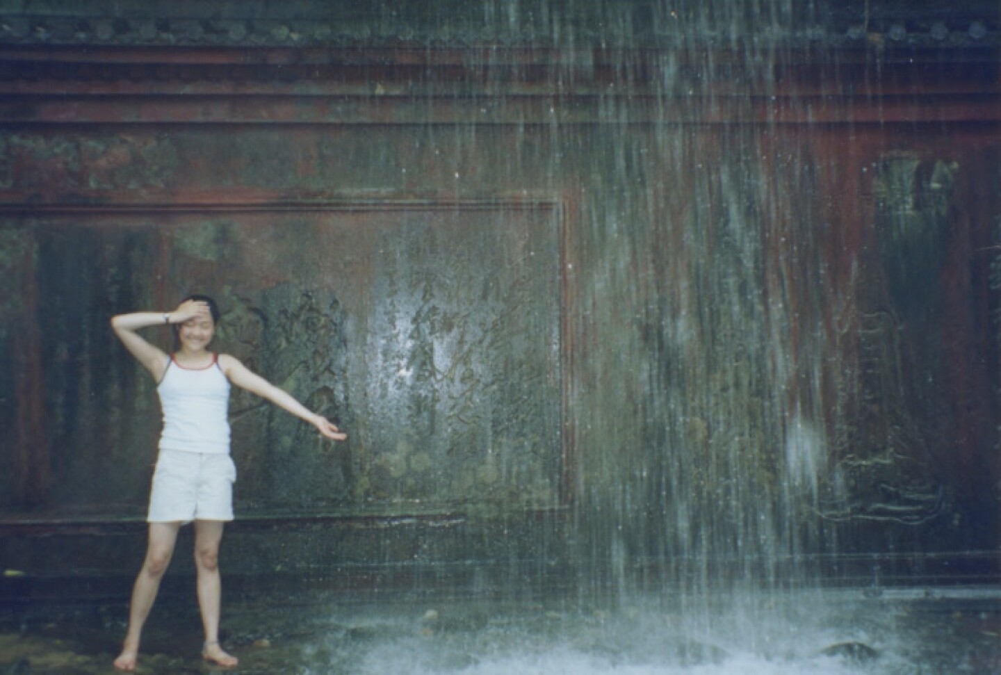 Yiming Amy Hua at age 12 on a rainy day during a family trip to China's Sichuan province.
