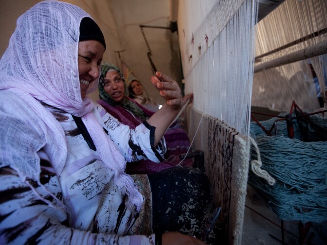 <p>Workers at a carpet-making business in the town of Kairouan are paid about $2.50 a day. Many carpet buyers are tourists, but the number of foreign visitors has dropped since the revolution.</p><p></p>