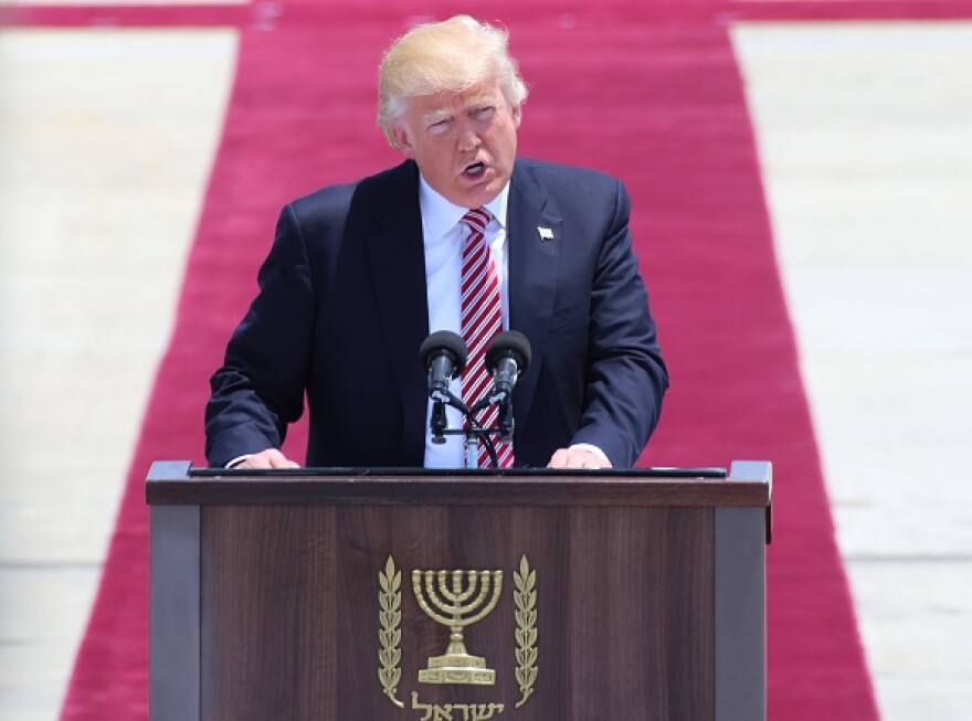 TEL AVIV, ISRAEL - MAY 22: US President Donald Trump speaks during an official welcoming ceremony on his arrival at Ben Gurion International Airport on May 22, 2017 in Tel Aviv, Israel. (Photo by Daniel Bar On/Anadolu Agency/Getty Images)