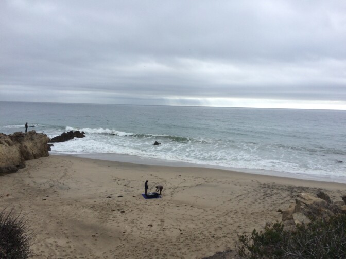 Brennon Edwards and Dominic Bendijo fly their drones over Sequit Point in Malibu.