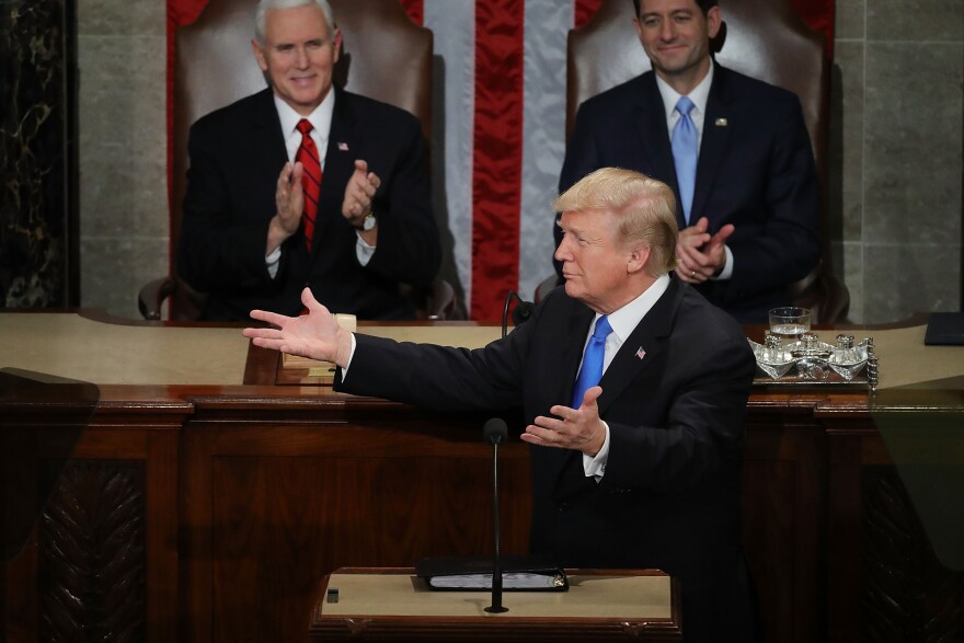 WASHINGTON, DC - JANUARY 30:  U.S. President Donald J. Trump delivers the State of the Union address as U.S. Vice President Mike Pence (L) and Speaker of the House U.S. Rep. Paul Ryan (R-WI) (R) look on in the chamber of the U.S. House of Representatives January 30, 2018 in Washington, DC. This is the first State of the Union address given by U.S. President Donald Trump and his second address to a joint meeting of Congress.  (Photo by Chip Somodevilla/Getty Images)