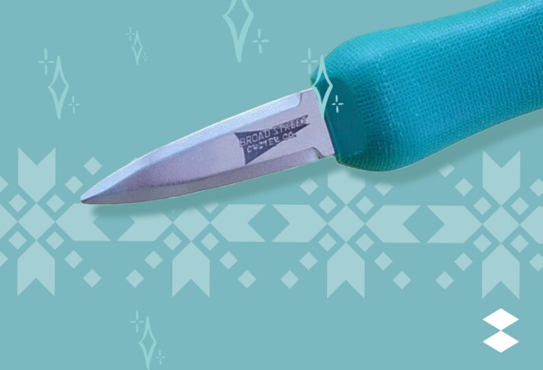 An oyster knife with a blue-green handle and metal blade