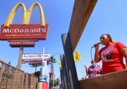 Fast-food workers rally for health and safety protections near a McDonald's in Los Angeles, in 2021