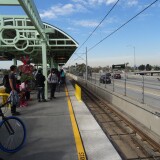 The Willowbrook Station along LA Metro's green line. This station is located above ground between the lanes of the Century Freeway.