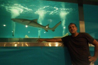 Shark handler Phillip Peters travels around the country with live sharks, and for your amusement, dives into his 5,000 gallon salt-water tank WITH HIS SHARKS for daily performances at the LA County Fair through September.