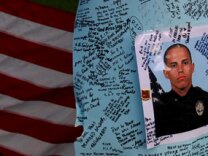 Memorial for slain officer Ryan Bonaminio near the site of his murder in Riverside’s Fairmount Park