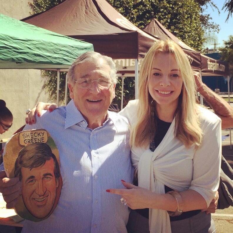 Alison Martino helped hand out caricatures that once lined the walls of West Hollywood restaurant Palm. When it closed, many of the subjects including Shecky Greene stopped by to save their images.