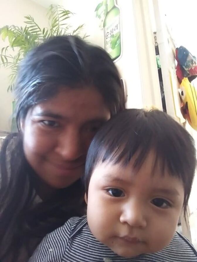 Noemí  Cruz holds her son Melquisedec